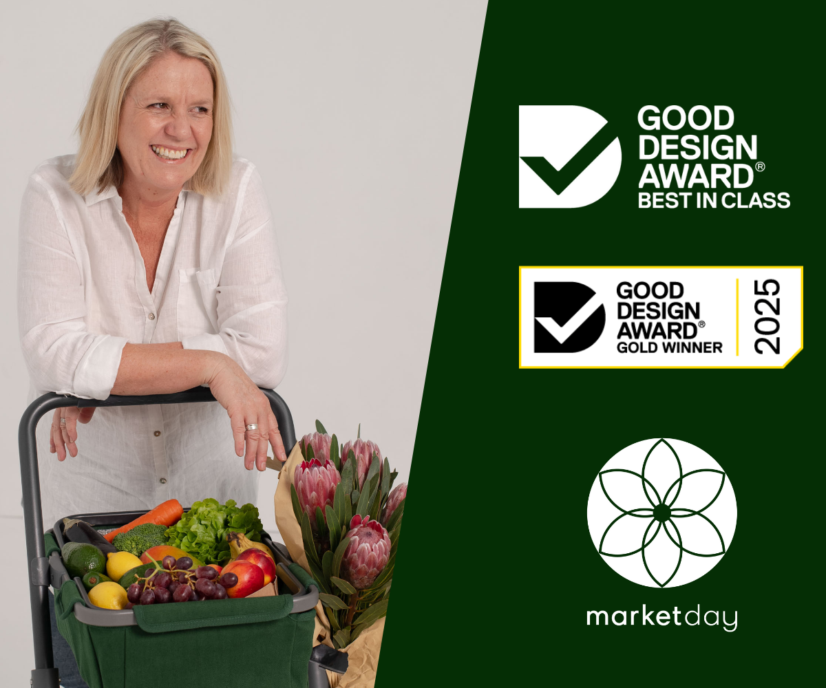 Founder of Marketday leaning on her Marketday Cart smiling. Next to her is a graphic in green with the 2 logos from recent awards - Good Design Gold Winner and Best in Class